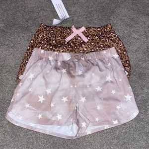 old navy kids medium (8) sleep shorts. Leopard print, and starry pink